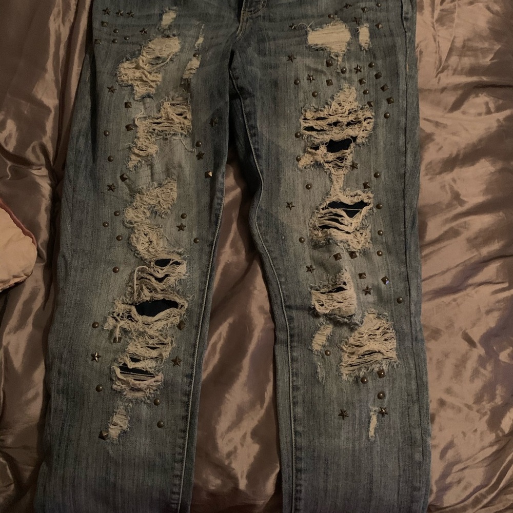 TORRID SZ 12 STUDDED-AND DESTROYED JEANS